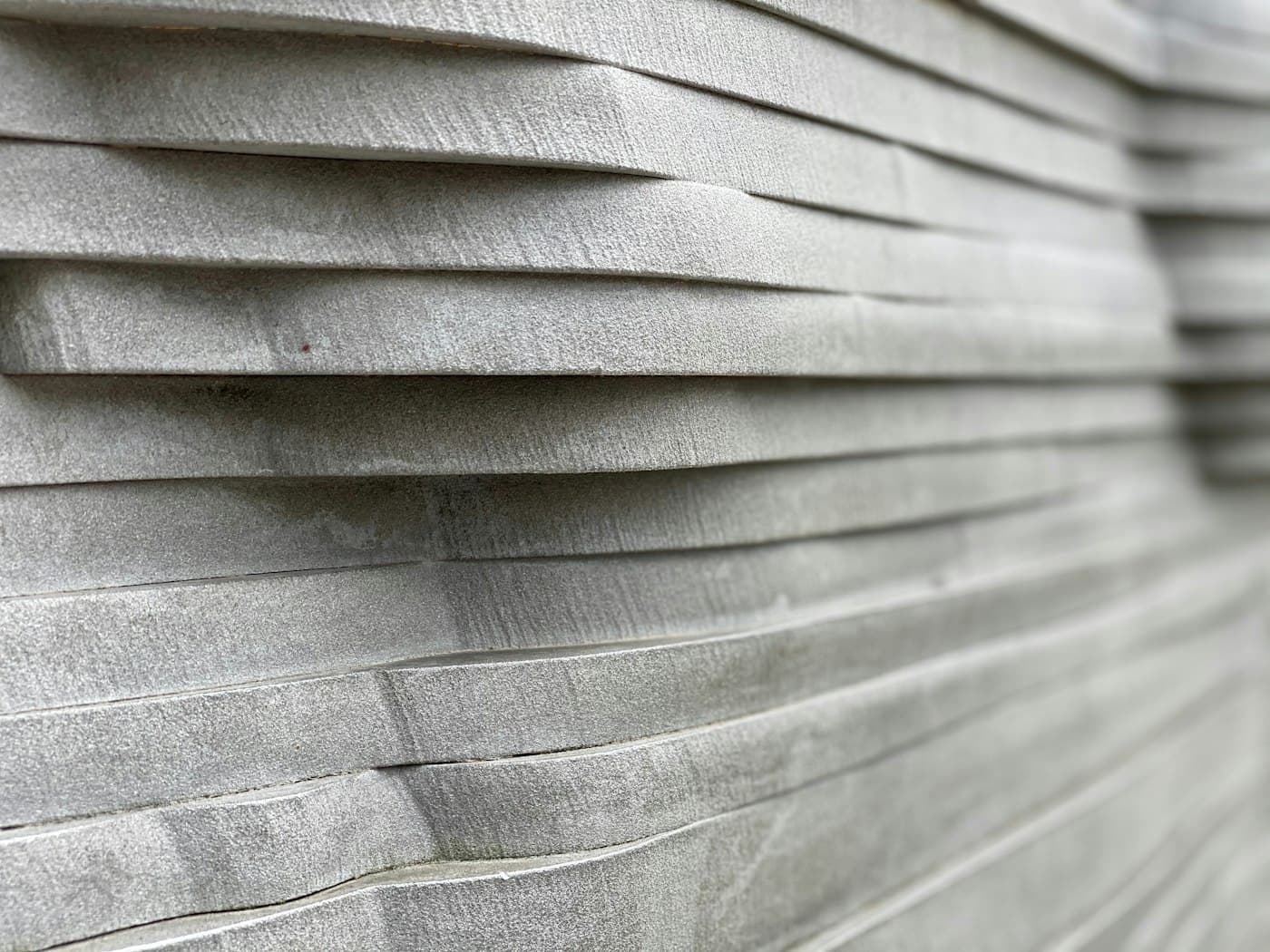 Stacked layers of stone and concrete slabs